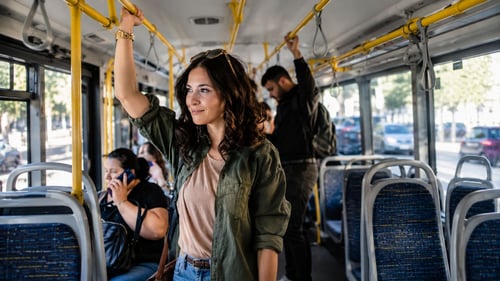 Girl riding bus